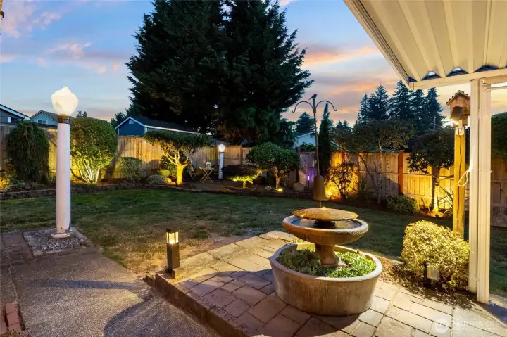 Another view of the back yard, tranquil fountain and retro lighting