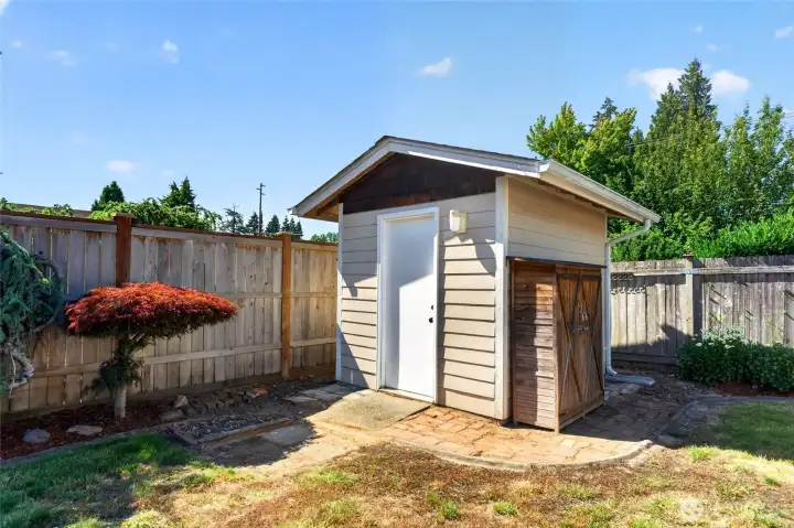 There are multiple sheds for your storage needs. This shed offers lighting and the small tool shed is perfect for your garden tools. There is another shed on the side of the home as well