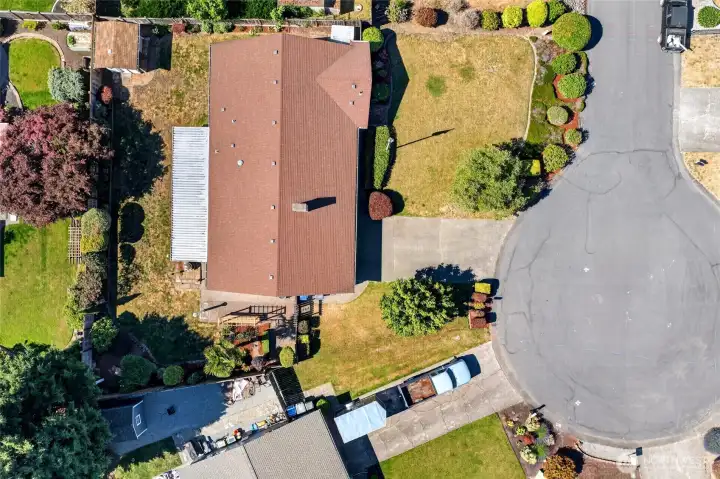 The aerial view shows how privately situated your lot is along with your quiet cul-de-sac