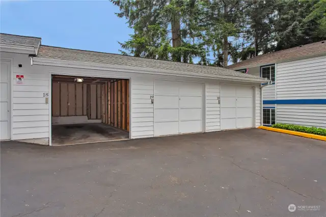 Garage with remote control, automatic opener, and an exterior key pad. The unit also comes with an uncovered parking space, #18. There are two visitor parking spaces as well.