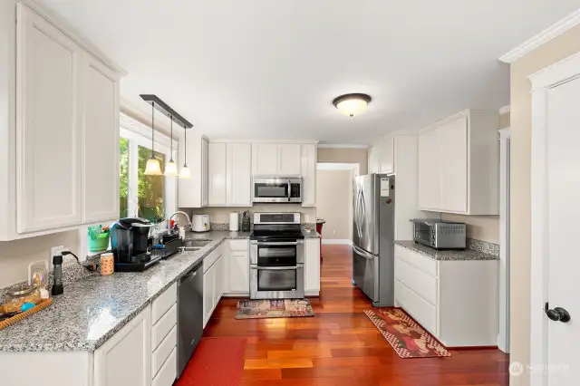 Spacious light and bright Kitchen open's to both Dining Room and Family Room. Pantry too!