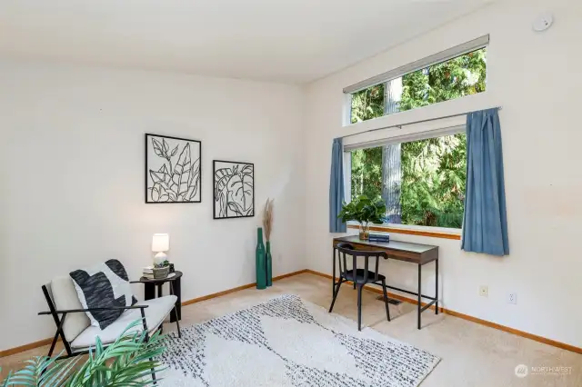 Second bedroom with its transom window provides nice view and natural light.  Would work well as a office and/or hobby room.