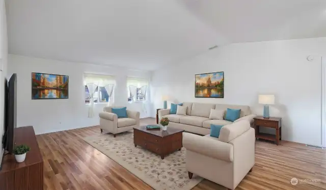 Another view of the living room with the vaulted ceiling. (Virtually staged)