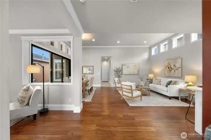Extensive gleaming Engineered hardwoods greet you into this open and light filled floorplan. Tons of windows, crown molding, fresh interior (and exterior!) paint and abundant privacy!