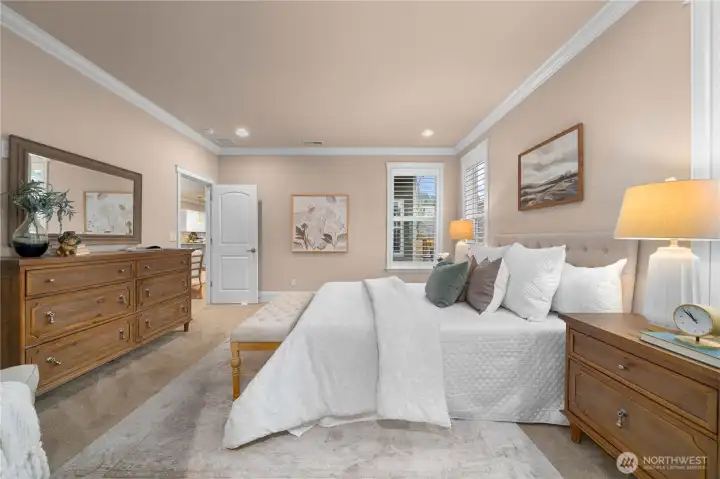 Spacious primary bedroom & offers crown molding (throughout).