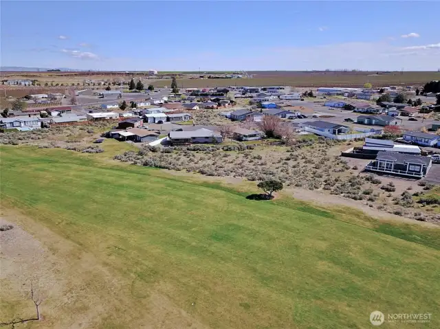 Golf course Aerial view of back of home.