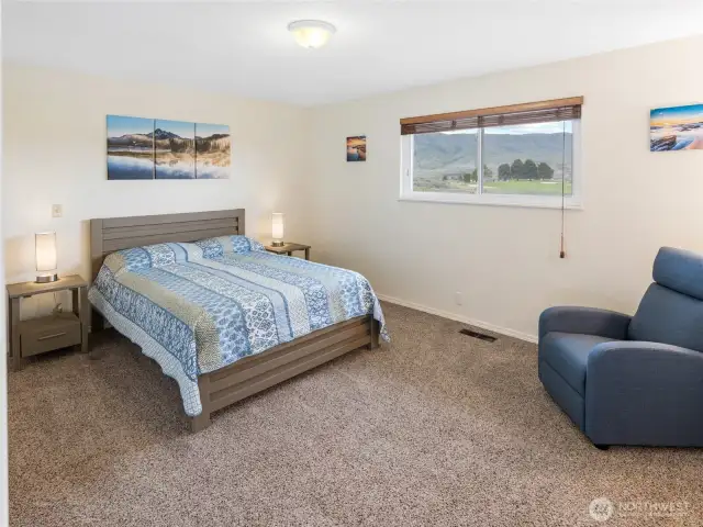 Primary bedroom with golf course views.