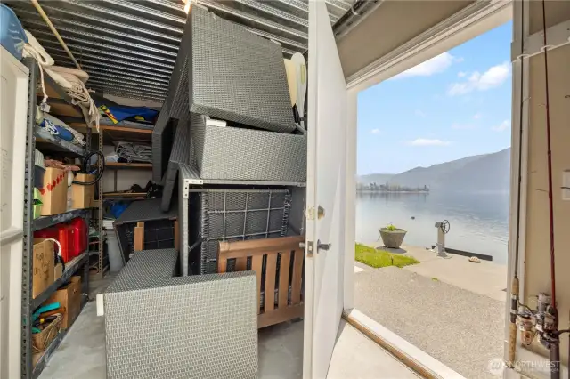 Storage room with oversized door for outdoor equipment storage with easy access