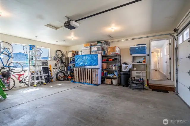 two car garage and plenty of driveway and street parking