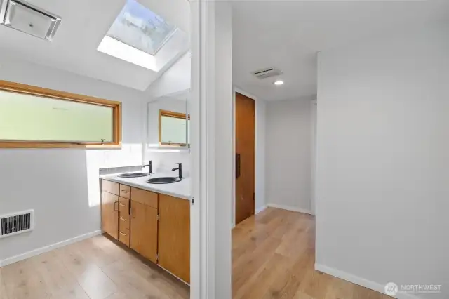 2nd floor bath and door to sauna