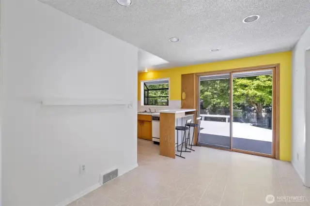 Dining kitchen bar and slider to deck