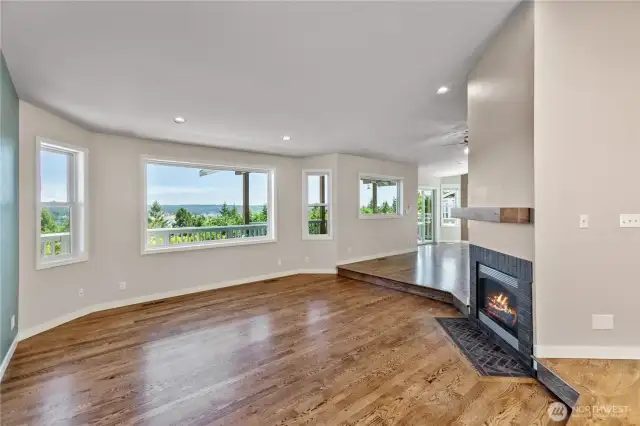 Sunken living room on main level has a gas fireplace for those cool winter nights