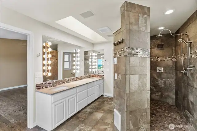 Dream shower with 2 shower heads and pleanty of hooks for towels, robes, etc.