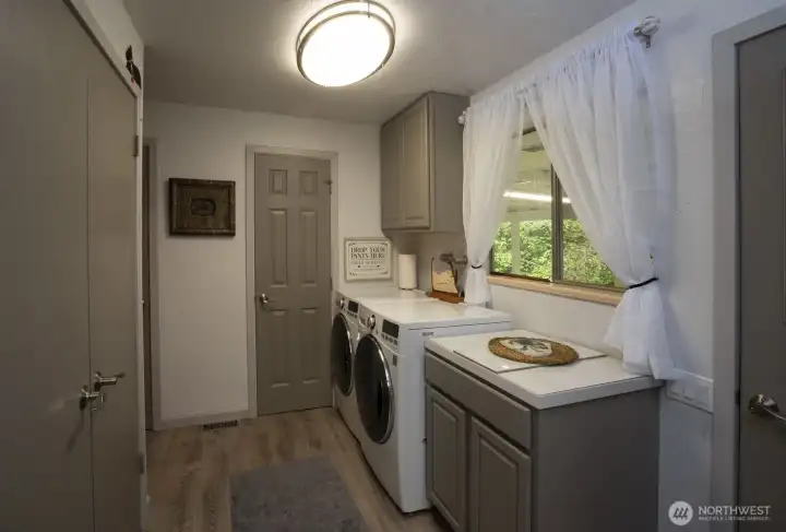 utility with door into a 1/4 powder room