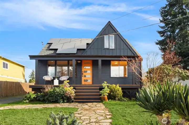 PNW foliage in your front and back yards that will light up in the Springtime! Covered front porch is divine!