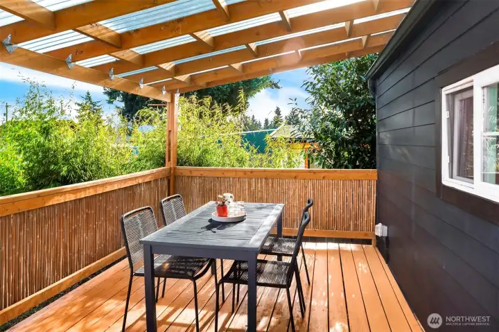 The new covered deck is the perfect place to enjoy your backyard all year long!