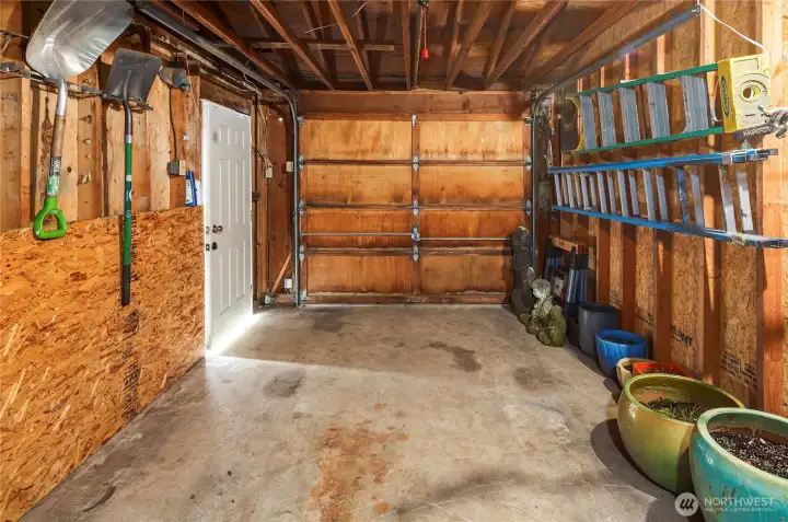 The detached garage, used as storage by the current owners as there is so much off street parking!