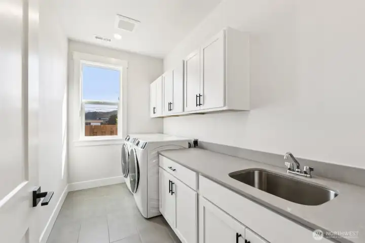 Pictures are of similar plan, materials and colors may vary