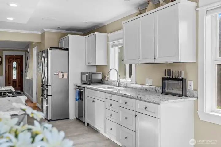 Bright and open kitchen with water views