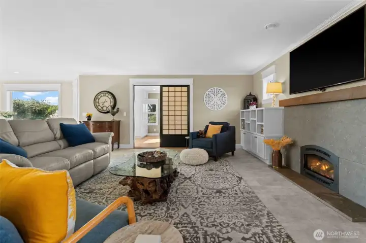 Living room with bonus room off the living area