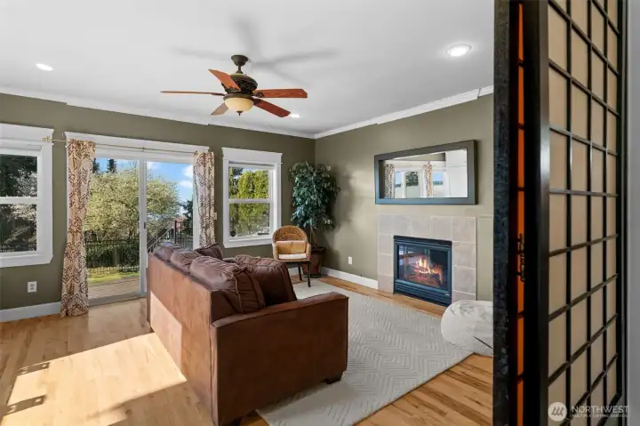 Large bonus room off the living room steps out to deck