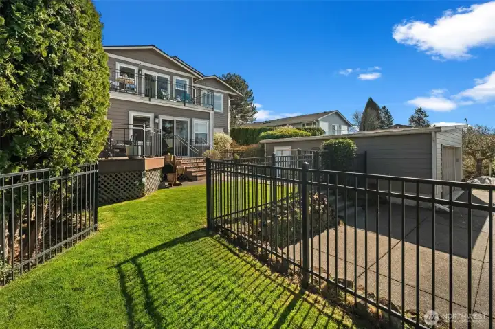 Deck and beautifully landscaped yard