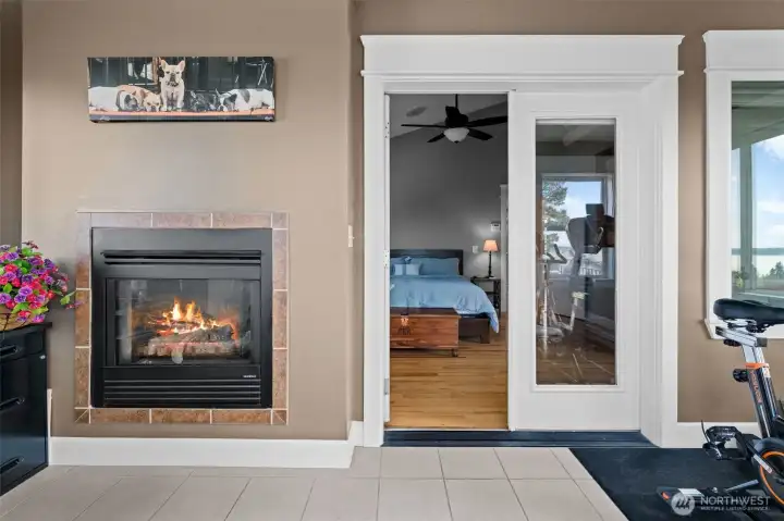 Bonus room off primary with fireplace and views of the water