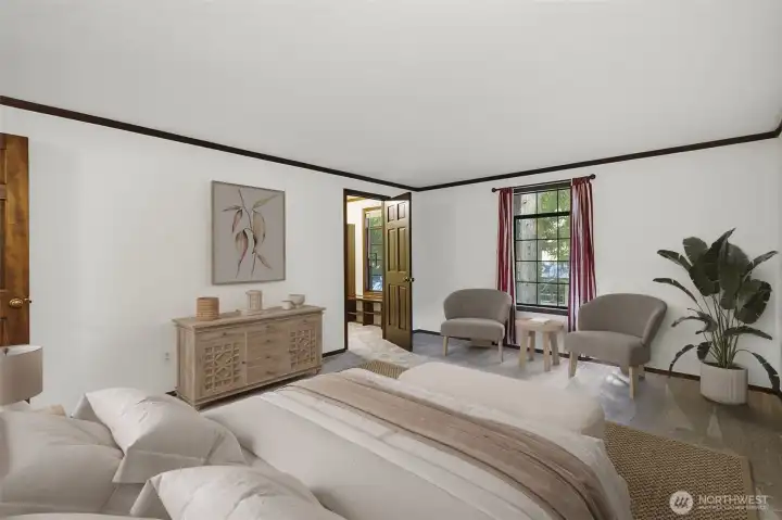 Primary bedroom with large walk-in closet and on-suite bathroom.