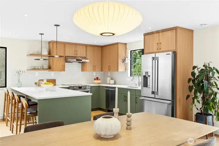 From the dining area to the kitchen. All new light fixtures were installed throughout the home.