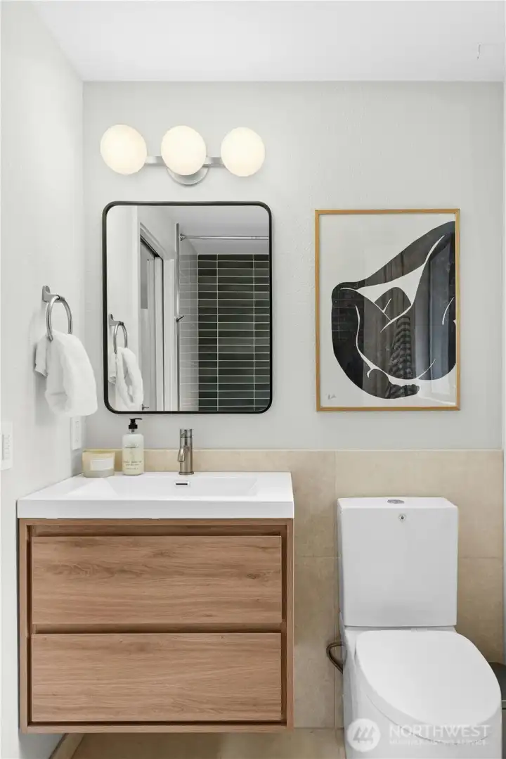 The new vanity in the primary bathroom with nice storage.