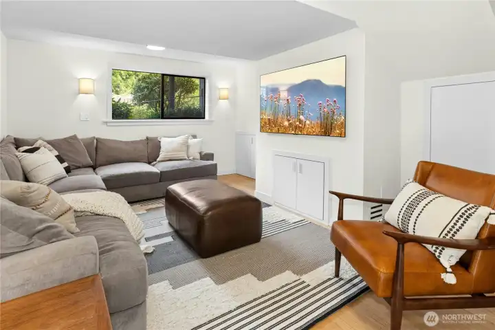 A wonderful private space for movies or gatherings. This could also be a nice home office option as there is a door to close it off. This room also has great storage.