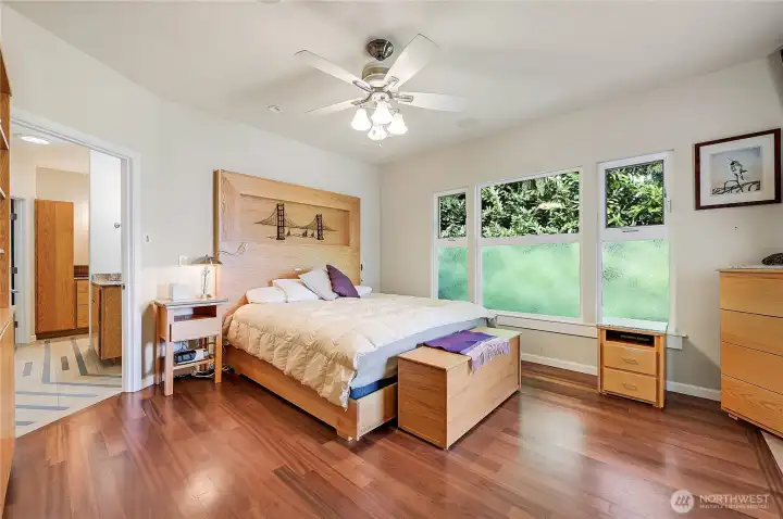 The primary bedroom has an incredible en-suite bathroom a a huge walk in closet.