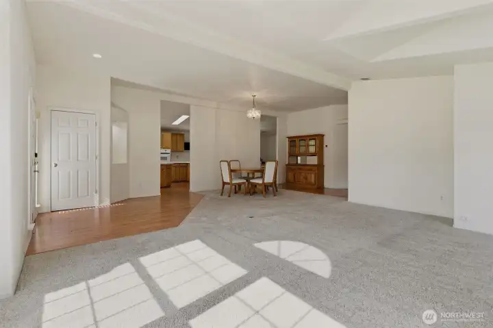 Looking across the living area toward the kitchen entrance