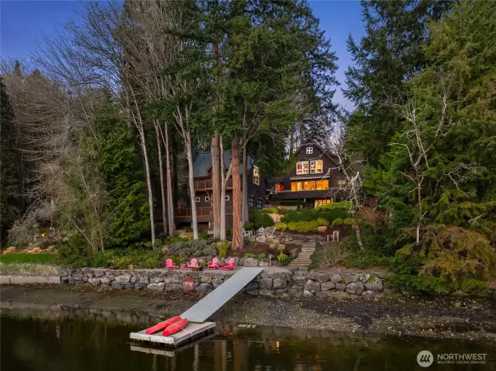 A view from the waters edge... of the main home and guest house...Just shy of 3000 sq.ft.