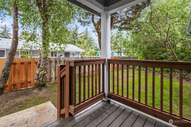Side yard and access from your home to back yard, covered deck with Trex decking.