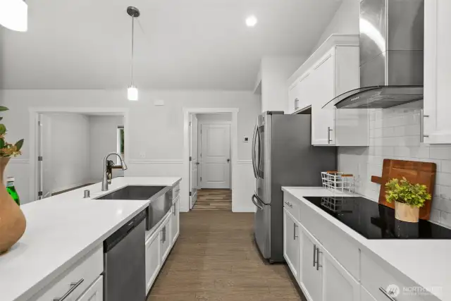 Dishwasher and farm sink in the island provides functionality