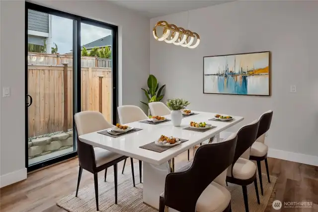 Connected dinning room and living room (Different unit, floor plan, & color scheme digitally staged)