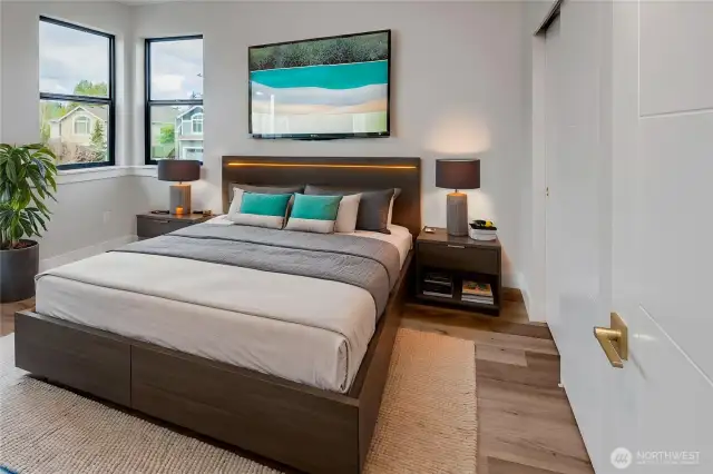 Large upstairs bedroom (Different unit, floor plan, & color scheme digitally staged)