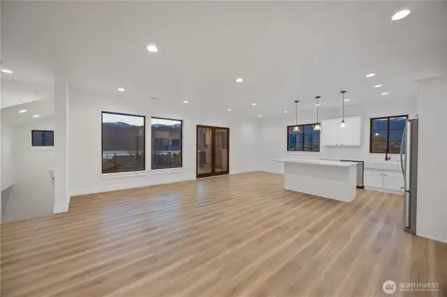 Living room, kitchen, dining and deck