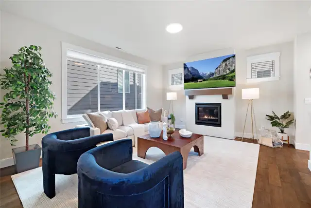Inviting living room with a gas fireplace.