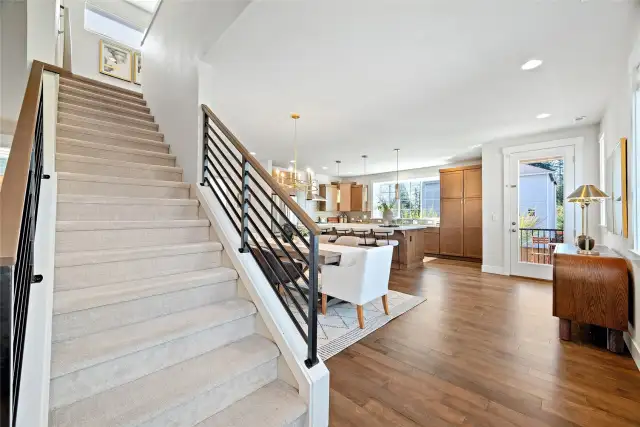 Sleek metal rail adds a touch of style and increases the visual square footage of the space.