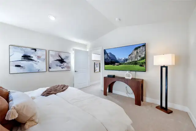 Another view of the primary bedroom.