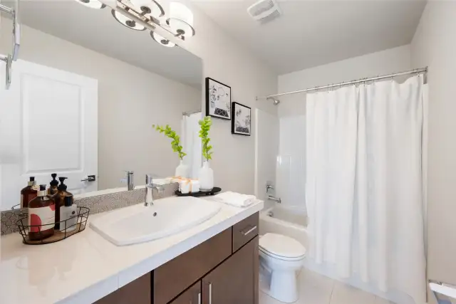 Kid's bath is right next to the kid's room.