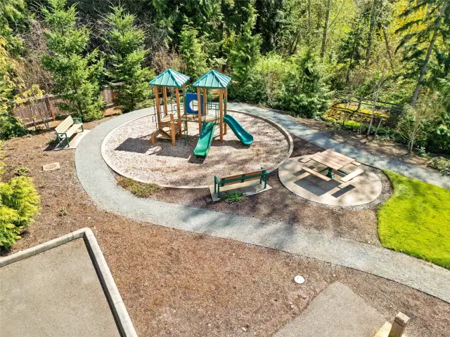 The community playground is just steps away from the home.