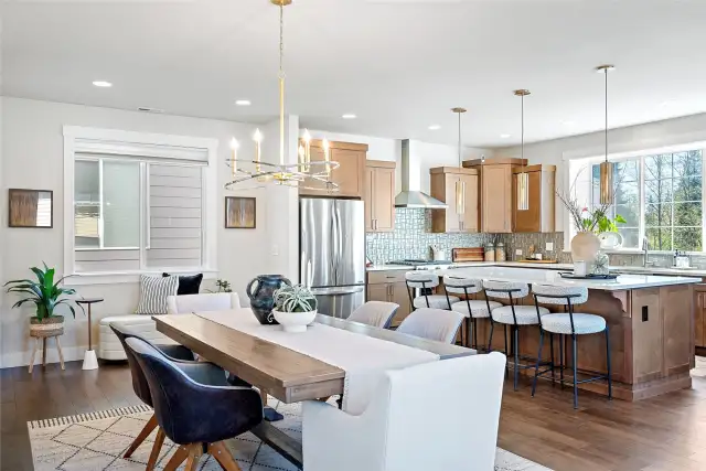 Open-concept living with the dining and kitchen in view.