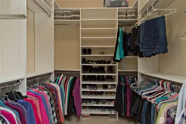 Primary bedroom walk-in closet