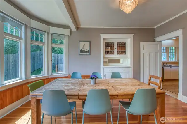 The dining room has a beautiful bump out panel of windows for south-facing natural light.