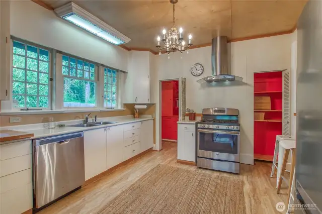 The generous kitchen space has room for an island workspace.