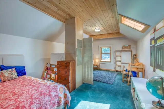 The upstairs bedroom is currently set up to share, but would make a great primary bedroom.