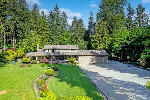 Peacefully perched down a long private driveway off the quiet cul-de-sac.